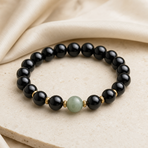 Black obsidian style bead bracelet with jade accent